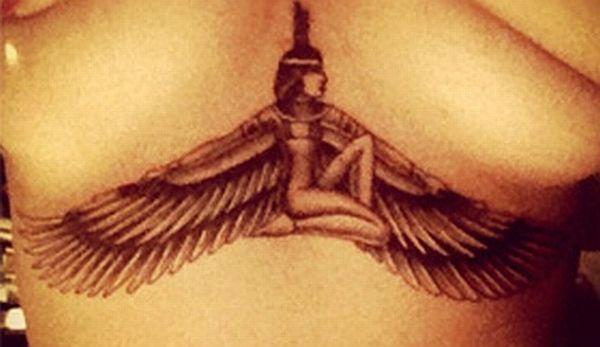 Rihanna ribcage  tattoo