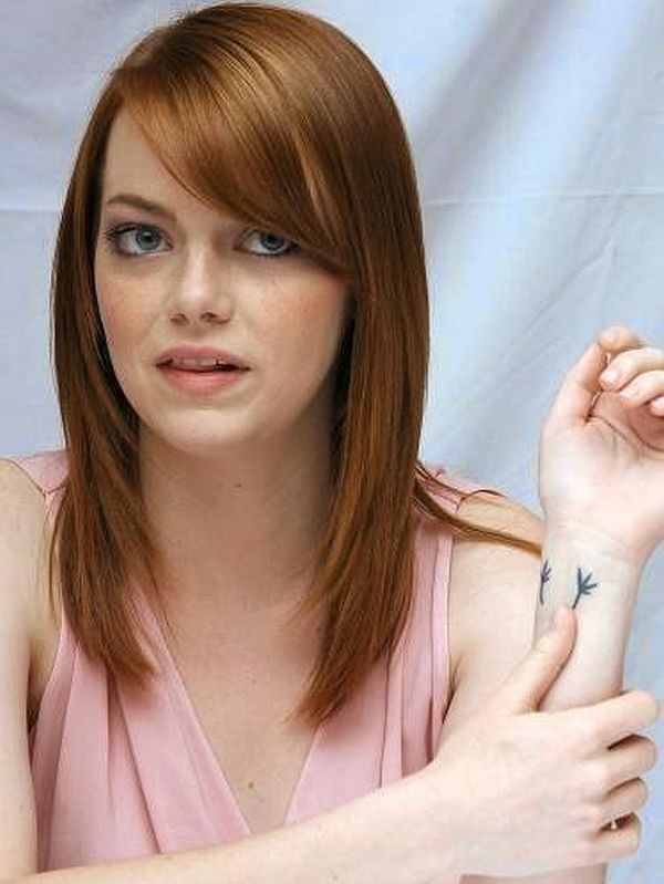 Emma Stone has a cute bird-feet tattoo on her wrist.