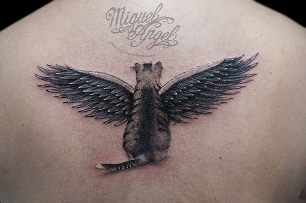 Angel winged cat tattoo