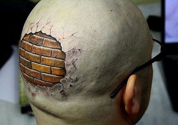 Bald head with bricks inside