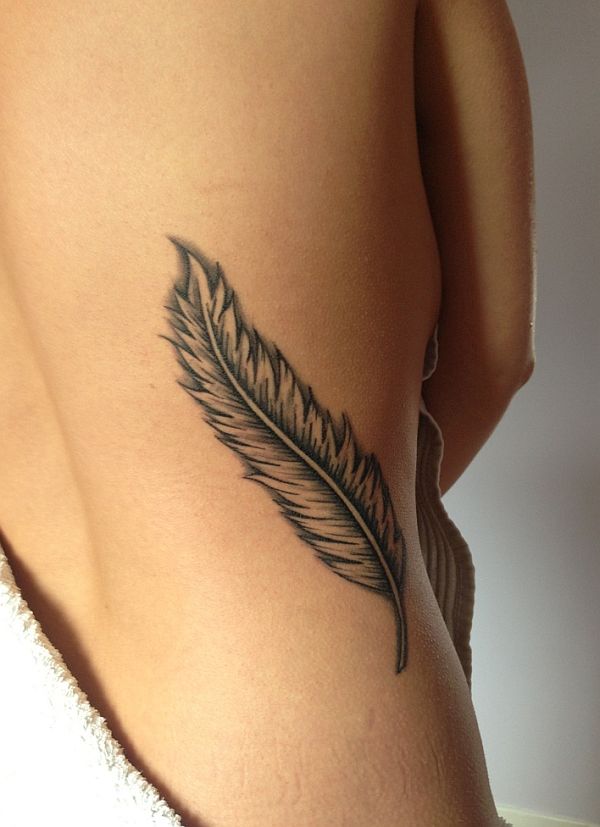Feather rib side tattoo