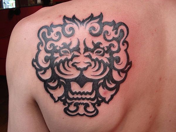 Tiger faced tribal tattoo