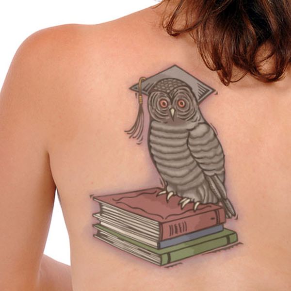 Girl’s owl tattoos