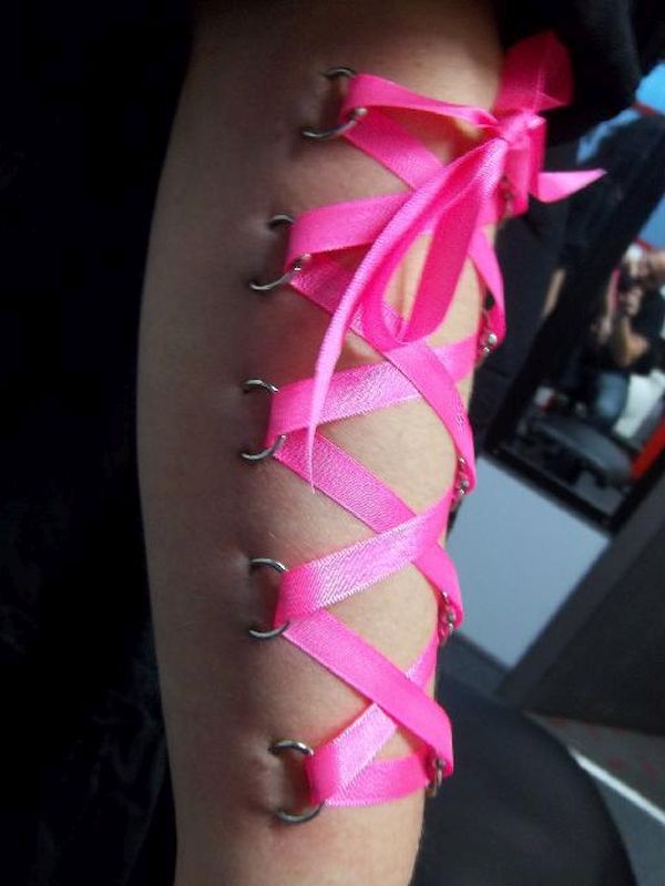 Corset piercing on forearms