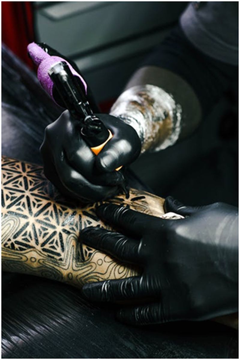 tattoo designer at work